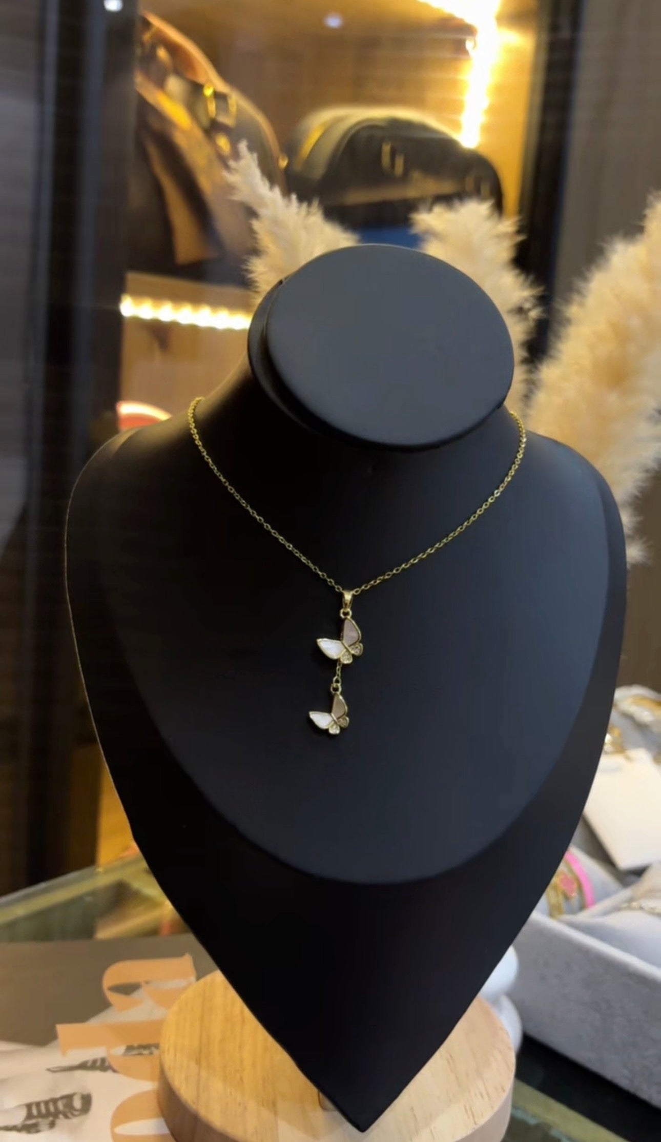 Layered butterfly pendant necklace